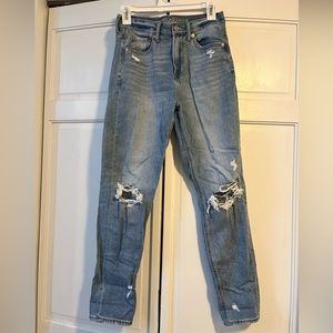 American Eagle. Size 2. High wasted light wash mom jeans with holes in knees.
